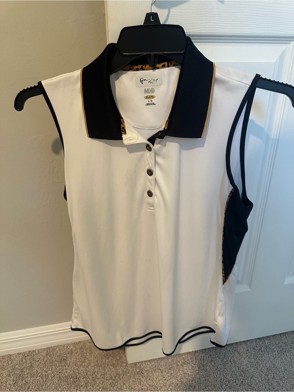 Greg Norman Collection White Sleeveless Polo with Black Collar and Gold Piping
